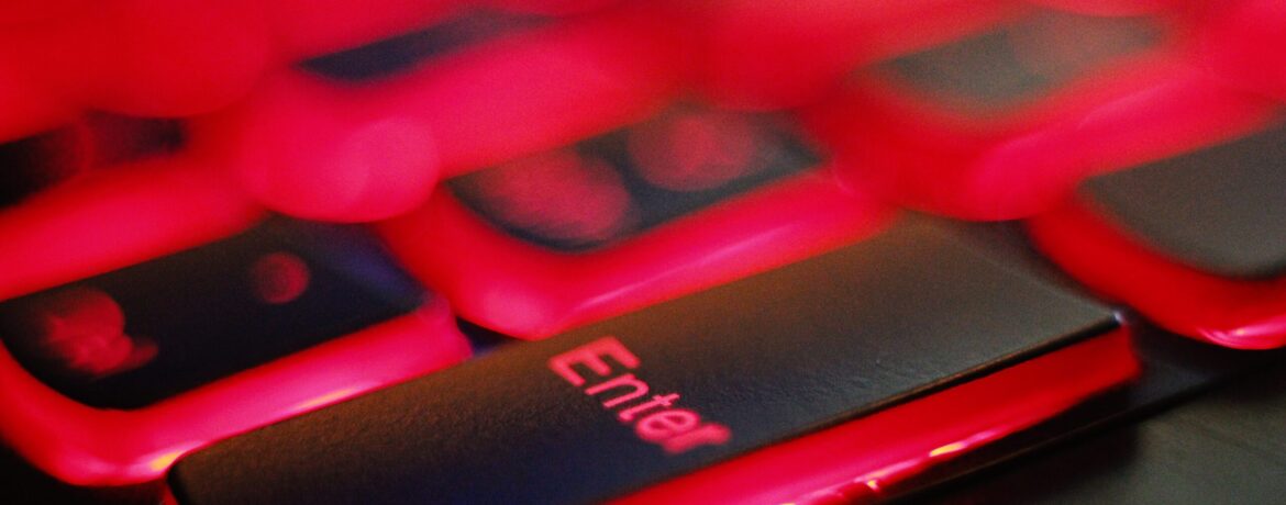 a close up of a red and black keyboard