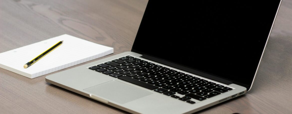 Free Silver Macbook Beside Iphone Stock Photo