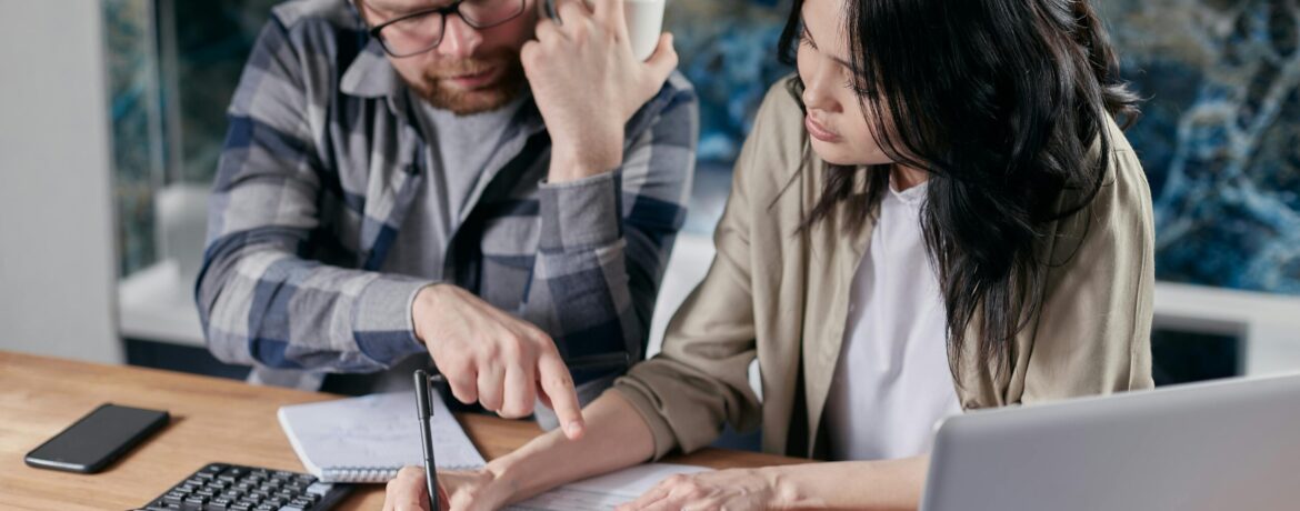 Free couple calculating al their bills stock photo